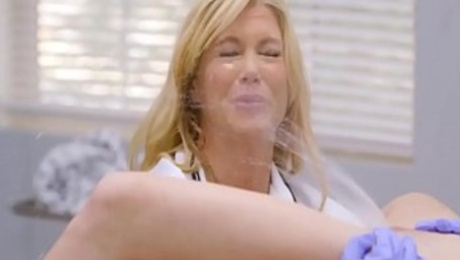Unaware doctor gets squirted in her face