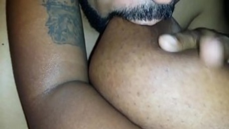 Lucky guy sucking big black nipples