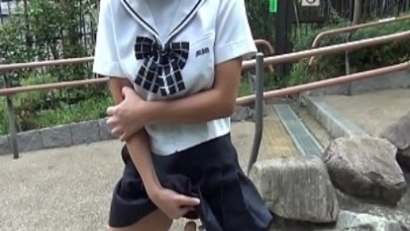 Japanese teen sucks dildo