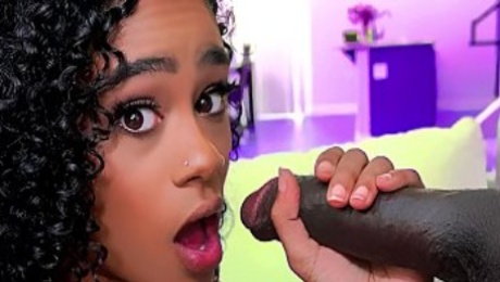 Beautiful black teen sucks on a huge black dick
