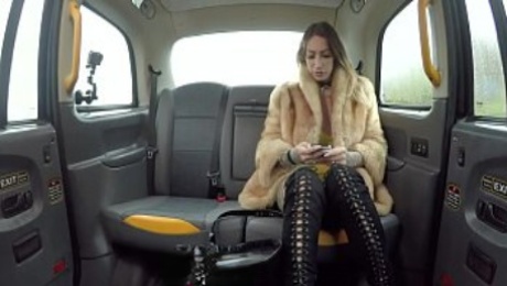 Fake Taxi Ava Austen rides a big black dildo on the backseat