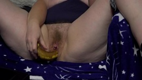 A powerful hole in hairy pussy crushed a banana and then fucked with a dildo. Mature BBW again cheating on her husband before the webcam.