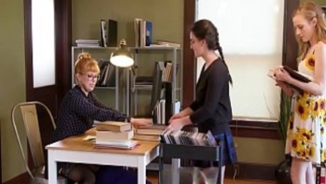 Two librarians and a customer lick pussy