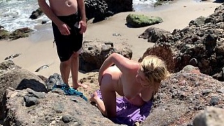 Voluptuous blonde sunbathing nude on the beach fucks passer-by - Erin Electra