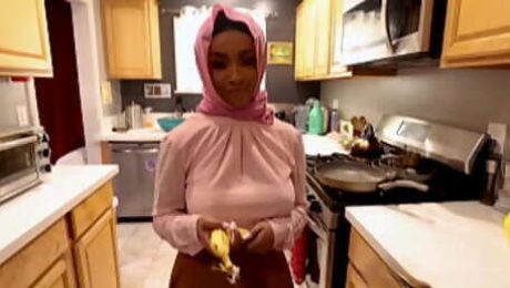 Hijab wearing babe Lily Starfire having a taste of an American cock and is eager to have it inside her