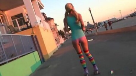 Roller teen (Heather Vandeven) shows off her pigtails and socks