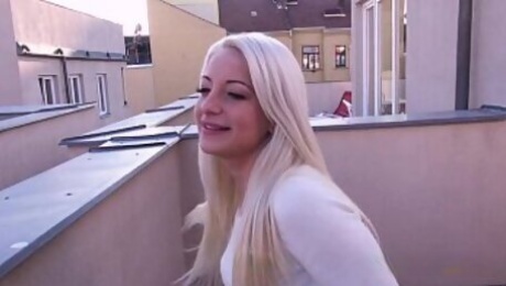 Blonde gives blowjob on roof top pov