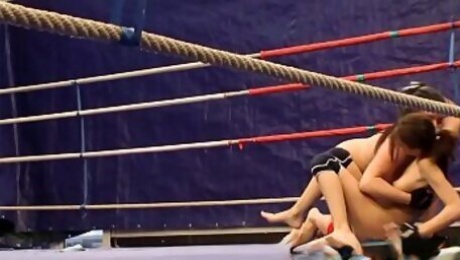 Naked lesbians wrestling in a boxing ring