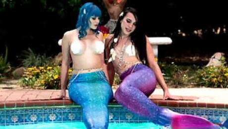 Jewelz Blu makes the perfect mermaid to be fucked by another tranny mermaid named Kasey Kei. Watch them as they reveal what's hidden behind their legs