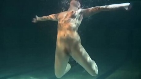 Dressed underwater beauty Bulava Lozhkova swimming naked