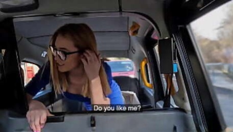 Fake Taxi Teen wearing thick rimmed glasses fucks a taxi driver who has a huge cock with girth