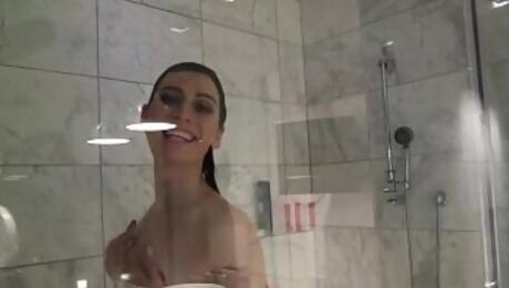 Smalltitted tranny showering while filmed