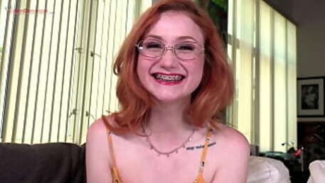 Watch the braces as redhead cute girl Scarlet Skies sucks dick!