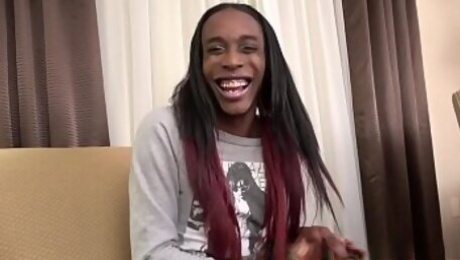 Black trans amateur masturbates on the sofa