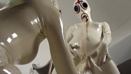 Nurses in latex pissing