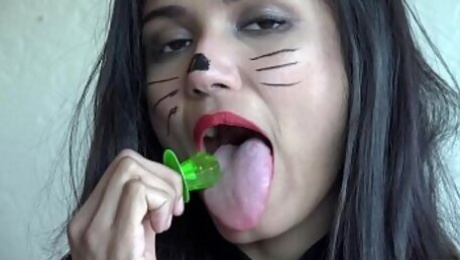 Licking a Lollipop.  Cat Pet Play. Viva Athena sucks a ring pop as a lollipop licker.  How many licks will it take for her to finish?  Don't you wish this was your cock?