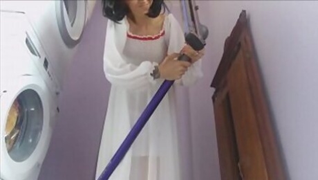 Chantal is a good housewife but sometimes she lingers too much with the vacuum cleaner