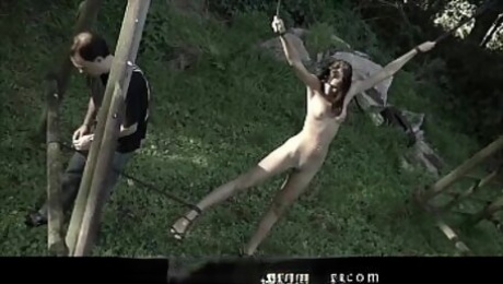 Hairy naked pussy outdoors tied and buttocks whipped