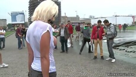 Busty blonde in wet shirt in public