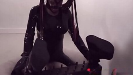 Latex tgirl pounds slave