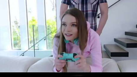 Jessae Rosae can't get enough of playing video games so her bf Brad Sterling takes out his dick so she can play with it while playing video games.