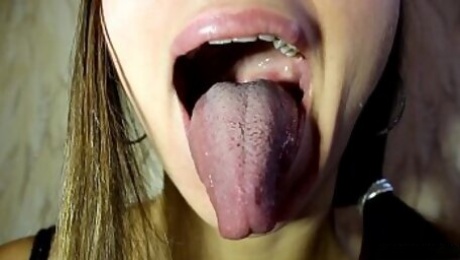 Fetish tongue Ananta Shakti and licking fingers