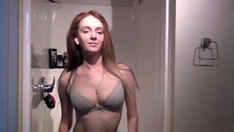 gorgeous sporty brunette amateur showering and spreading pussy lips