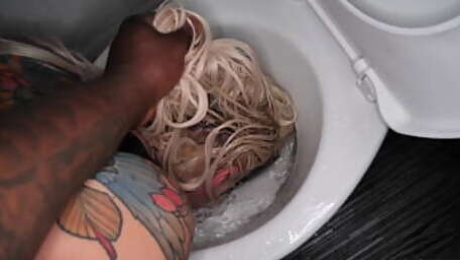 British slut gets face flushed in toilet and pee treatment