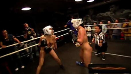 Ebony pornstar Angela Lady Armani and Jamie Lynn fighting in a boxing ring