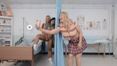 Blonde cougar gets busy sharing ripe pussy in hospital with another hot nurse