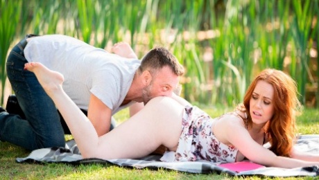 An astonishing redhead angel Ella Hughes fucked on the grass