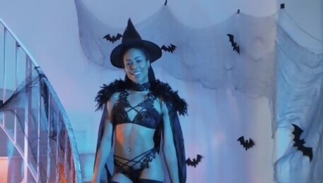Ebony witch Kira teasing in solo cosplay scene