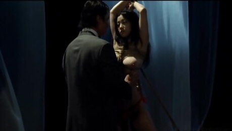 Bound Asian Actress Gets Dicked In A Standing Position